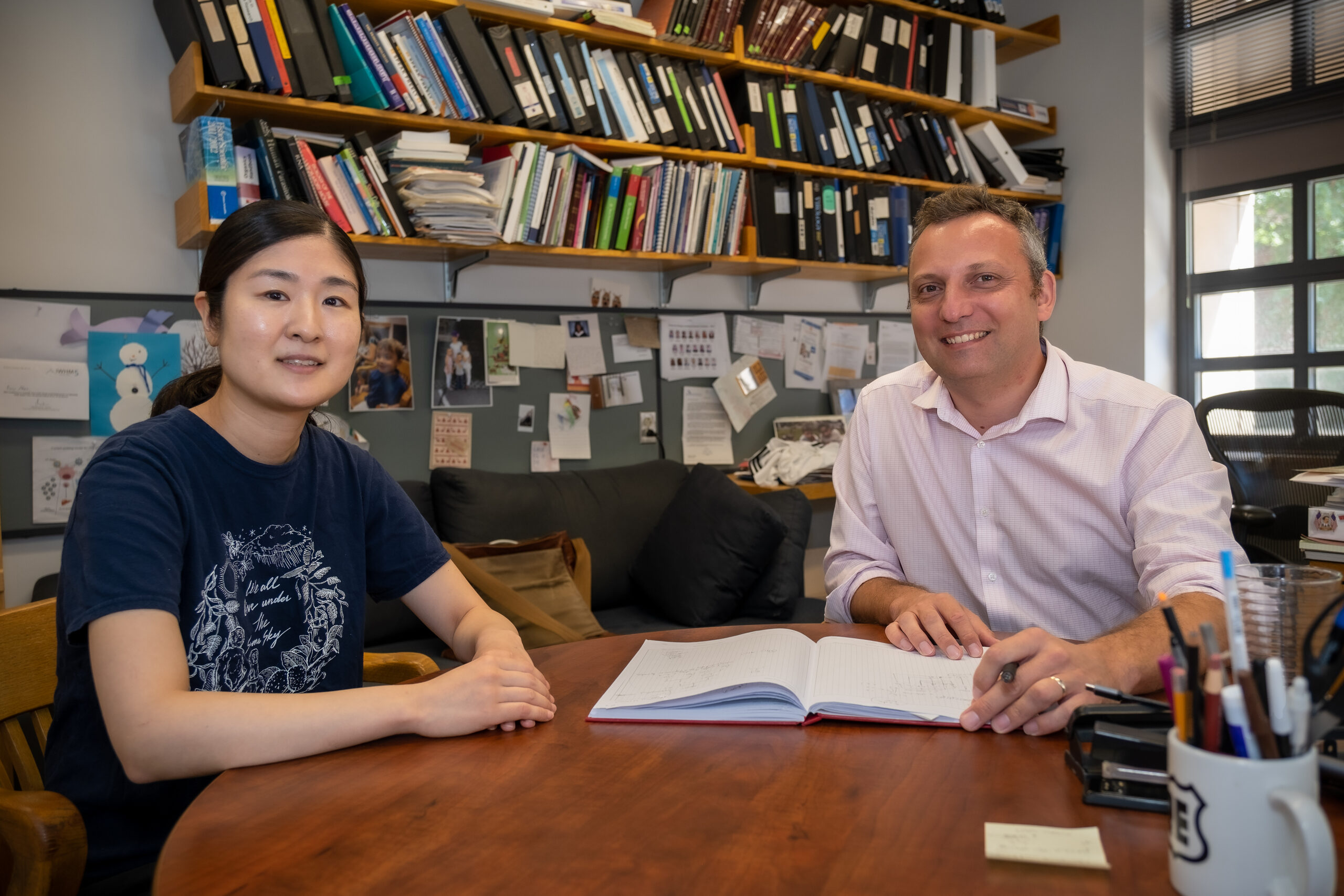 Saori Suzuki, a postdoc in the Ploss Lab and lead author on the JACS paper; and Alexander Ploss, professor of Molecular Biology.