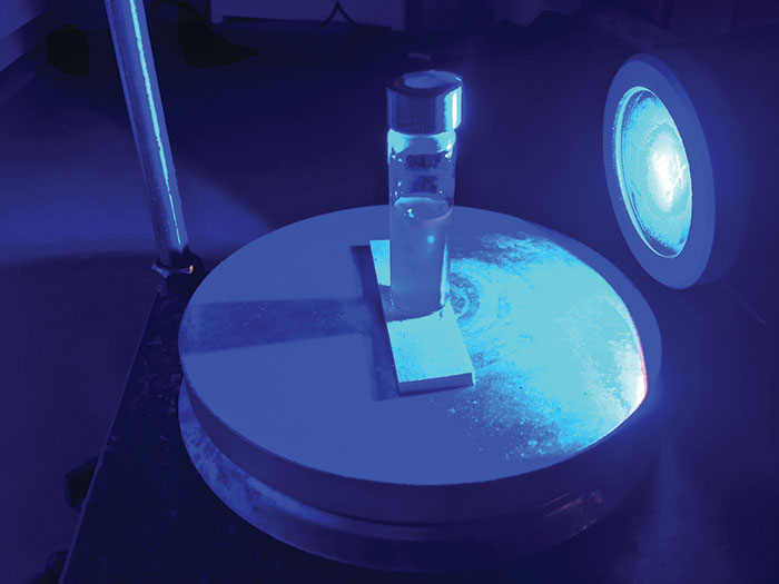 A blue LED shines on a vial containing heavy water...